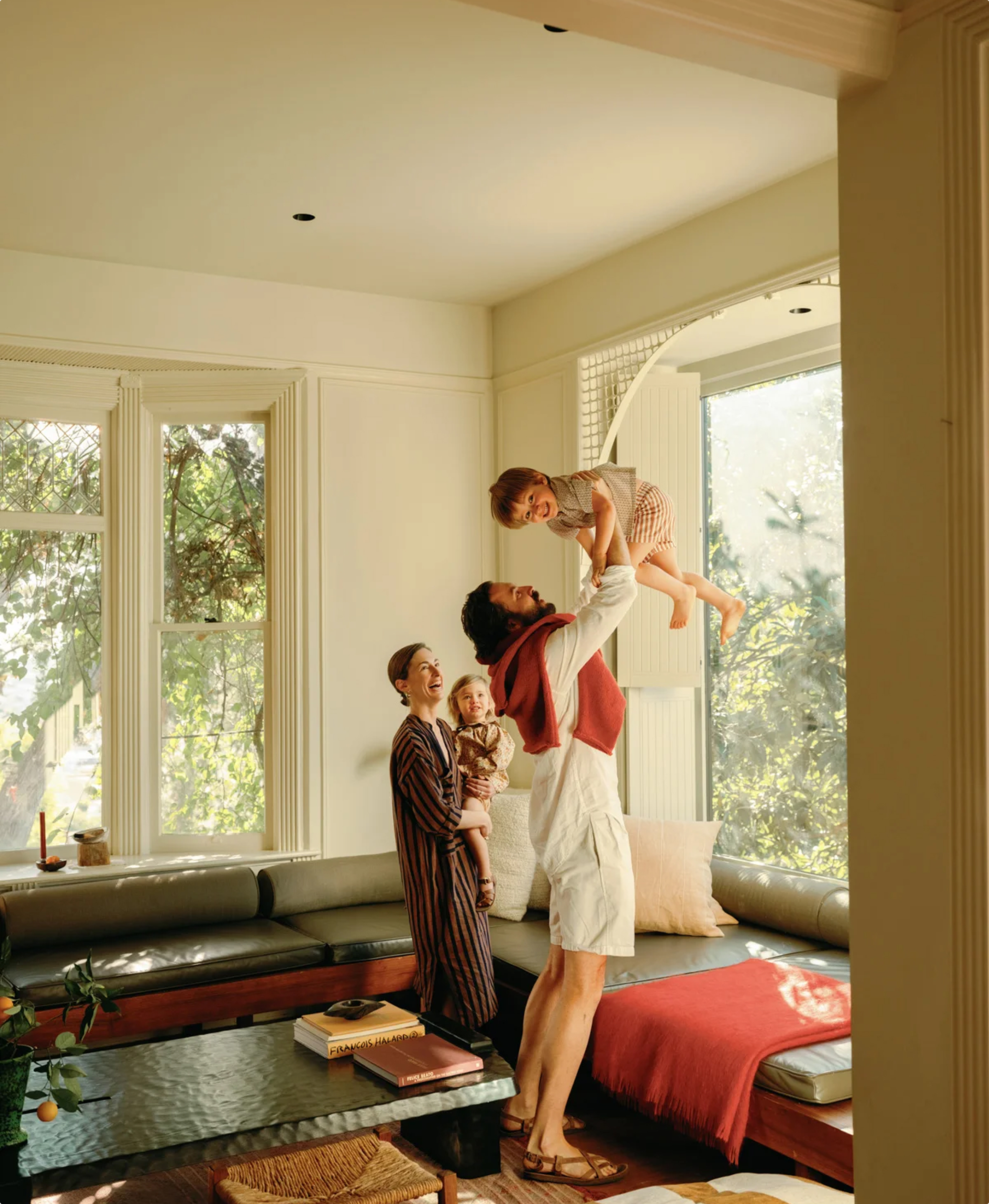 A Daylight customer family in their sunlit living room